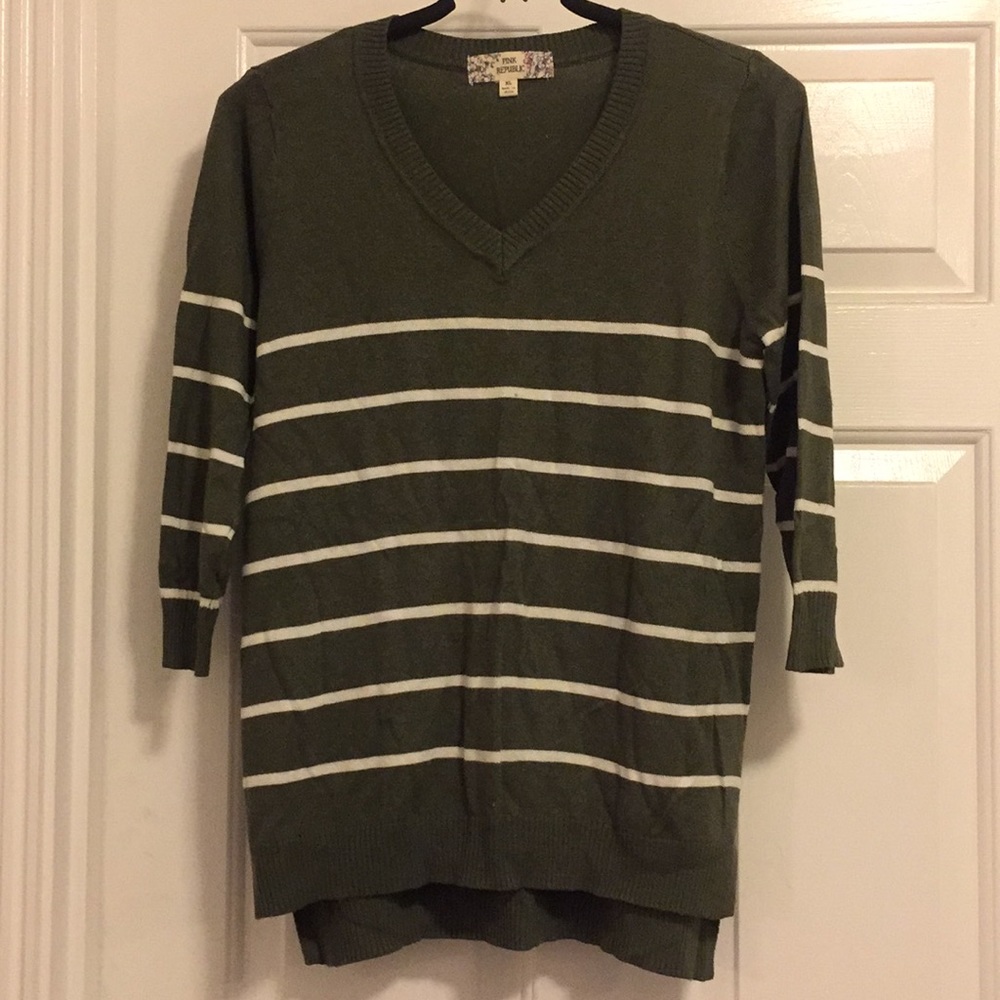 Green and white striped sweater